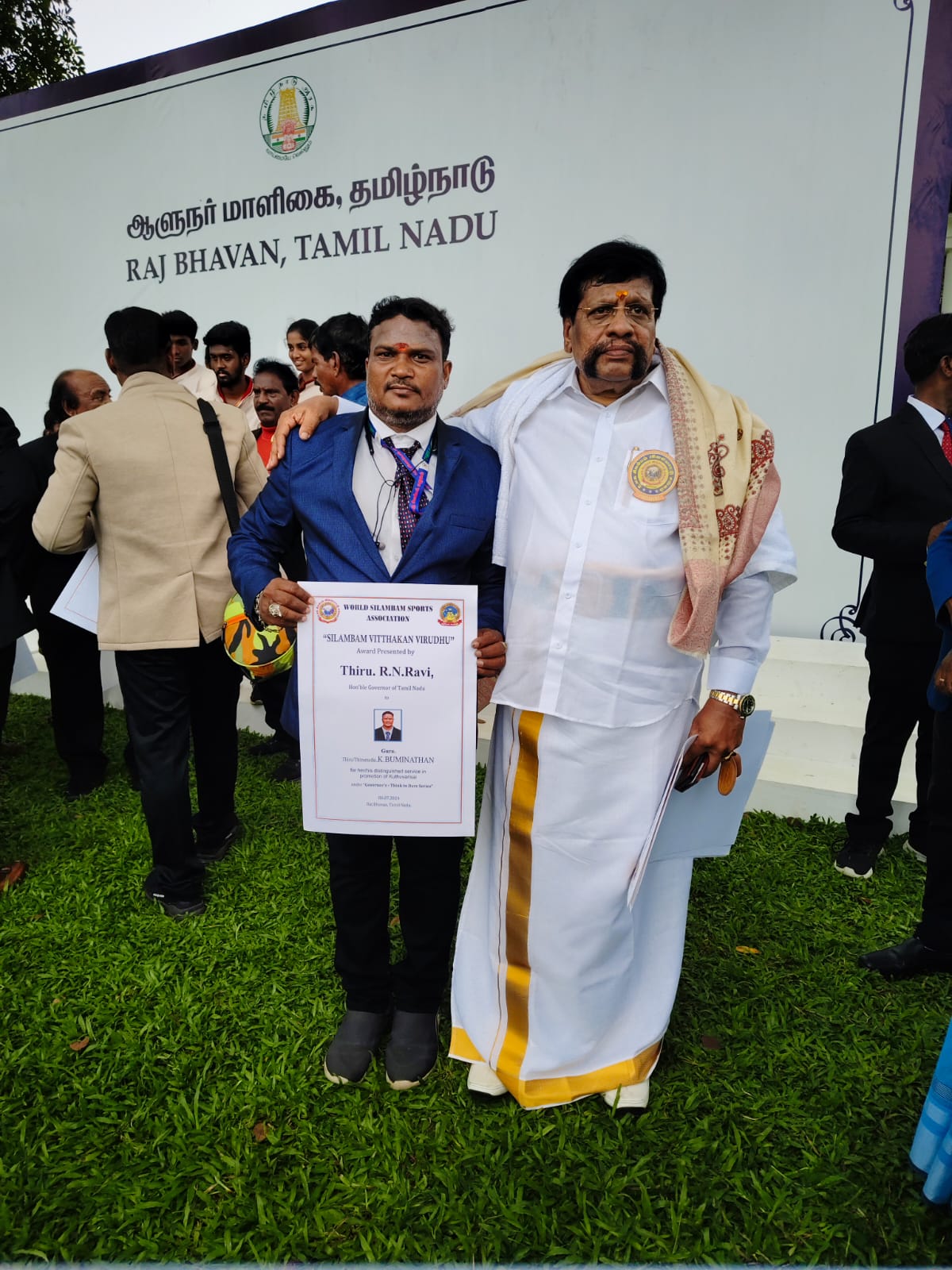 Master K. Buminathan receiving Silambam Vitthakan Virudhu award at Raj Bhavan Tamil Nadu